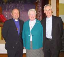 On the day of her institution, the Rev Elizabeth Hanna is flanked by the Bishop of Connor and the Rev Ronnie Nesbitt of Bangor Abbey, where Liz was curate.